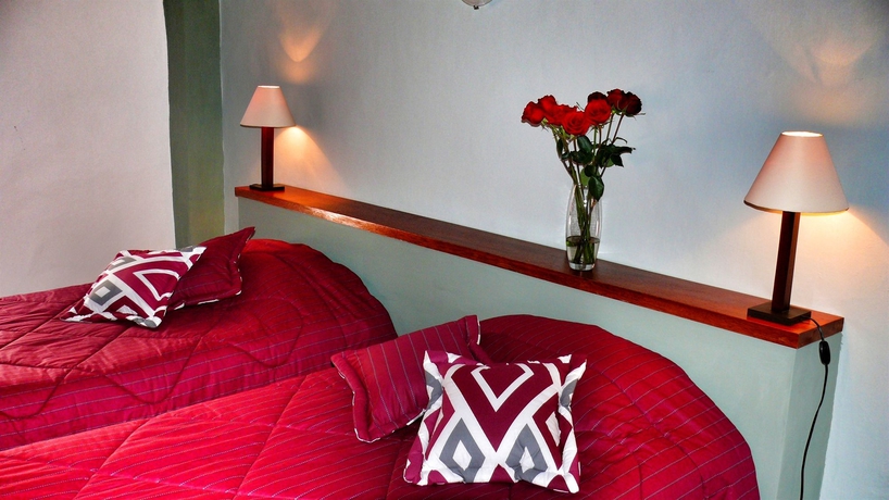 Imagen de la habitación del Hotel Casa De Las Rosas. Foto 7