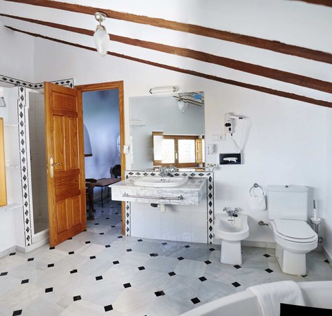 Imagen de la habitación del Hotel Casa De Los Arcos. Foto 2