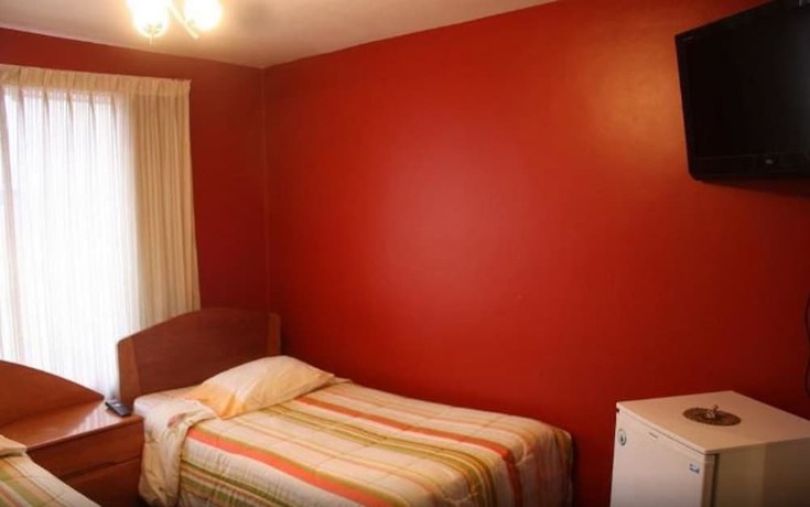 Imagen de la habitación del Hotel Casa De Mi Abuelo Hostal. Foto 8