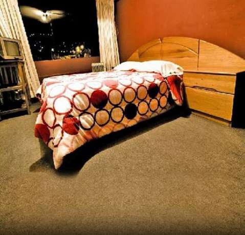 Imagen de la habitación del Hotel Casa De Mi Abuelo Hostal. Foto 11