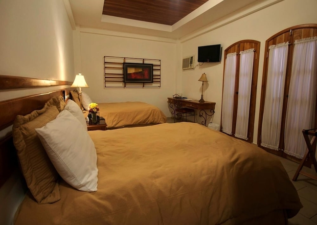 Imagen de la habitación del Hotel Casa Del Arbol. Foto 8