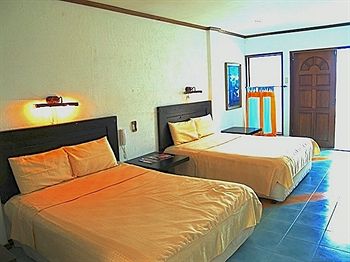 Imagen de la habitación del Hotel Casa Del Mar Beach Resort. Foto 6