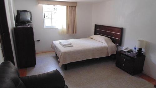 Imagen de la habitación del Hotel Casa Del Rio-spa. Foto 7