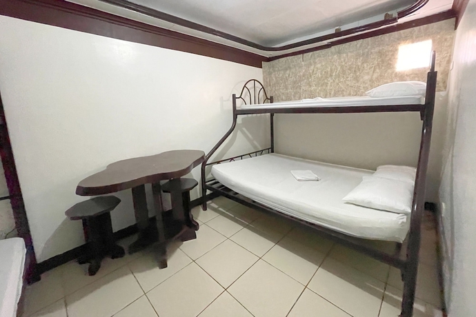Imagen de la habitación del Hotel Casa Dolores Laiya Batangas. Foto 3