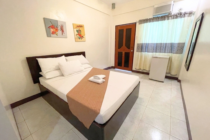Imagen de la habitación del Hotel Casa Dolores Laiya Batangas. Foto 6