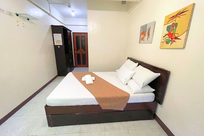 Imagen de la habitación del Hotel Casa Dolores Laiya Batangas. Foto 7