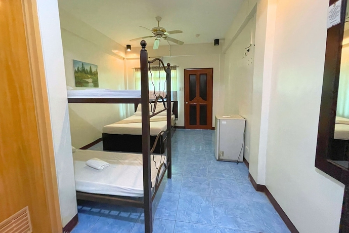 Imagen de la habitación del Hotel Casa Dolores Laiya Batangas. Foto 9