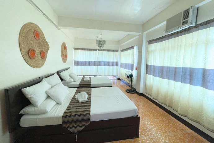 Imagen de la habitación del Hotel Casa Dolores Laiya Batangas. Foto 10
