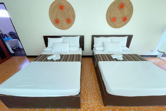 Imagen de la habitación del Hotel Casa Dolores Laiya Batangas. Foto 11