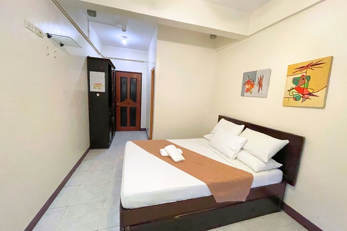 Imagen de la habitación del Hotel Casa Dolores Laiya Batangas. Foto 12