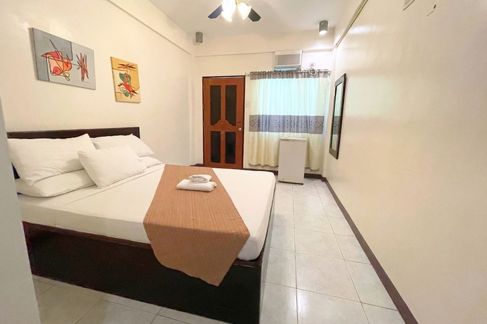 Imagen de la habitación del Hotel Casa Dolores Laiya Batangas. Foto 13