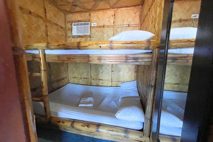 Imagen de la habitación del Hotel Casa Dolores Laiya Batangas. Foto 14