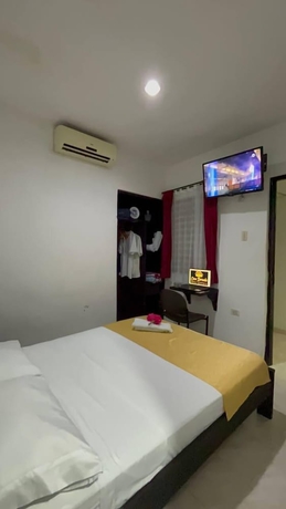 Imagen de la habitación del Hotel Casa Dorada Boutique. Foto 5