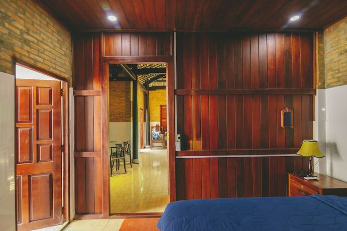 Imagen de la habitación del Hotel Casa Eco Mekong Homestay. Foto 11