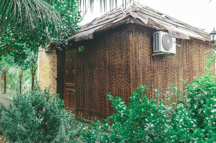 Imagen de la habitación del Hotel Casa Eco Mekong Homestay. Foto 12