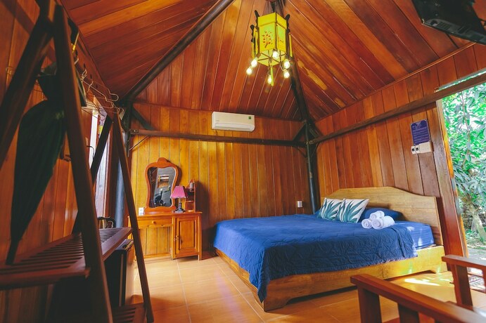 Imagen de la habitación del Hotel Casa Eco Mekong Homestay. Foto 14