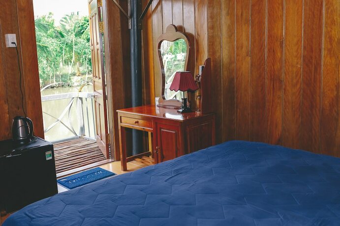 Imagen de la habitación del Hotel Casa Eco Mekong Homestay. Foto 16