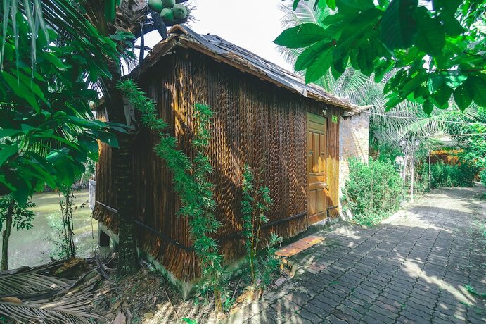 Imagen de la habitación del Hotel Casa Eco Mekong Homestay. Foto 17