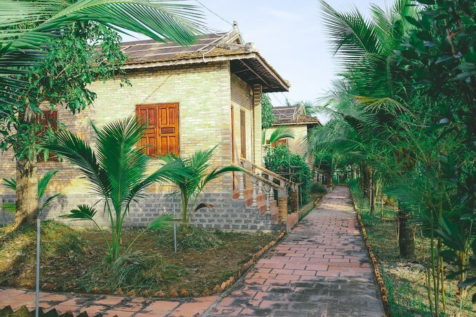 Imagen de la habitación del Hotel Casa Eco Mekong Homestay. Foto 18
