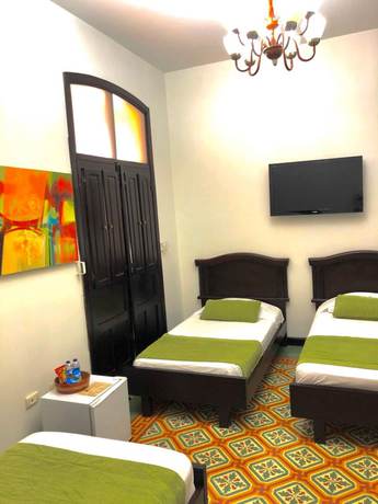 Imagen de la habitación del Hotel Casa Escobar Buga. Foto 7