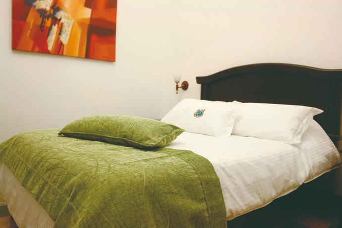 Imagen de la habitación del Hotel Casa Escobar Buga. Foto 8