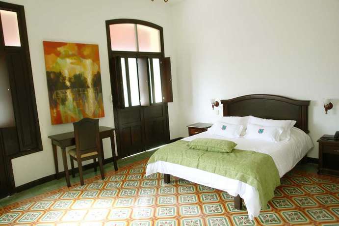 Imagen de la habitación del Hotel Casa Escobar Buga. Foto 11