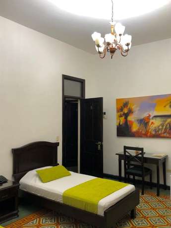 Imagen de la habitación del Hotel Casa Escobar Buga. Foto 14