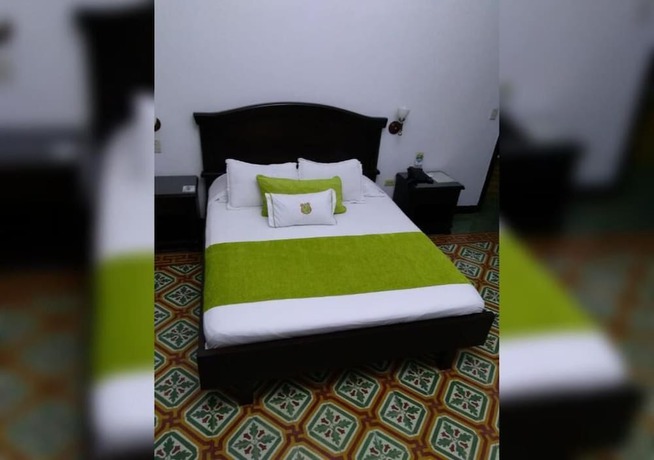 Imagen de la habitación del Hotel Casa Escobar Buga. Foto 15