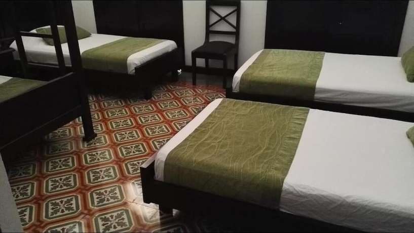 Imagen de la habitación del Hotel Casa Escobar Buga. Foto 16