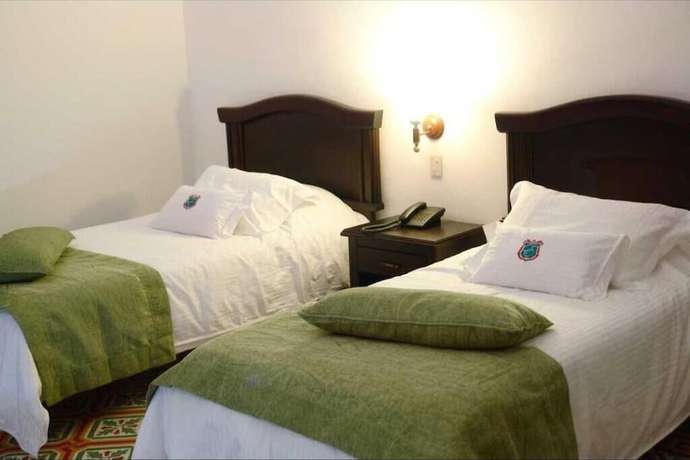 Imagen de la habitación del Hotel Casa Escobar Buga. Foto 17