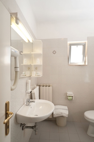 Imagen de la habitación del Hotel Casa Ferretti Di Ferretti Village. Foto 17