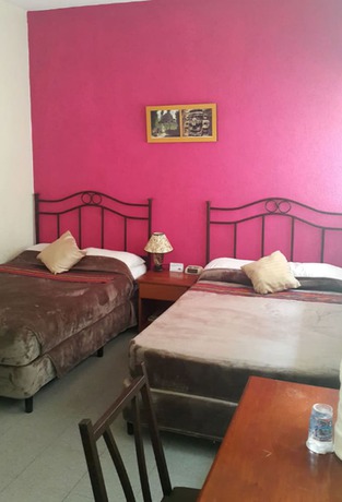 Imagen de la habitación del Hotel Casa Flores De Tikal. Foto 2