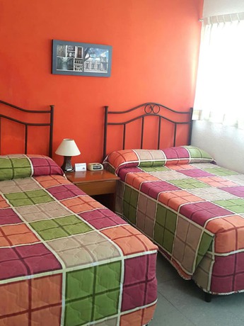 Imagen de la habitación del Hotel Casa Flores De Tikal. Foto 4