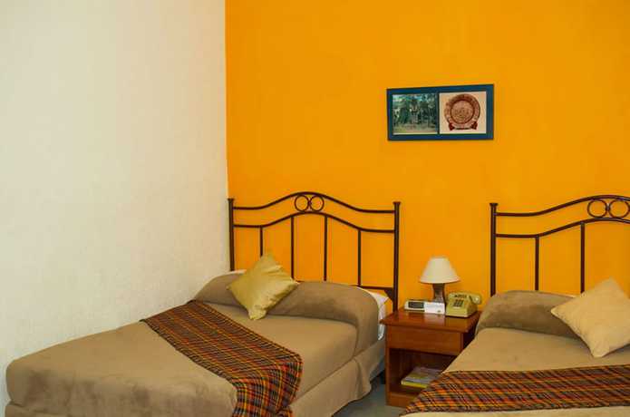 Imagen de la habitación del Hotel Casa Flores De Tikal. Foto 6