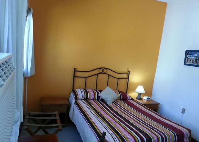 Imagen de la habitación del Hotel Casa Flores De Tikal. Foto 8