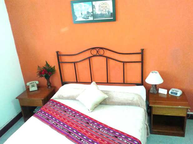 Imagen de la habitación del Hotel Casa Flores De Tikal. Foto 12