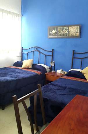 Imagen de la habitación del Hotel Casa Flores De Tikal. Foto 13