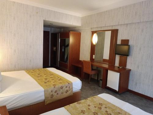 Imagen de la habitación del Hotel Casa Fora Beach Resort. Foto 4