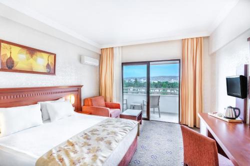 Imagen de la habitación del Hotel Casa Fora Beach Resort. Foto 8