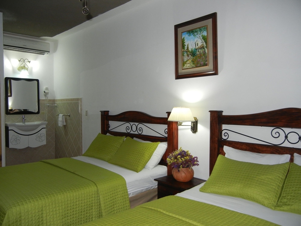 Imagen de la habitación del Hotel Casa Gabriela. Foto 12