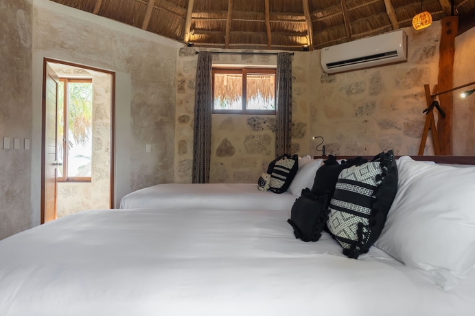 Imagen de la habitación del Hotel Casa Ganesh Tulum. Foto 6