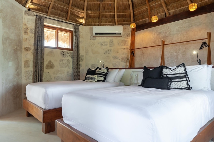 Imagen de la habitación del Hotel Casa Ganesh Tulum. Foto 7