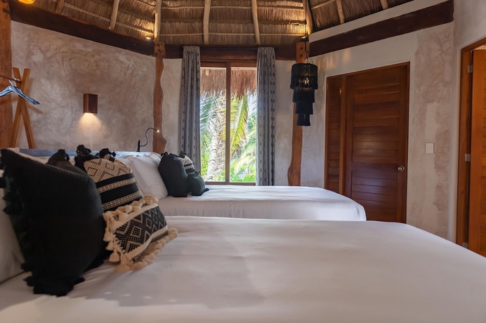 Imagen de la habitación del Hotel Casa Ganesh Tulum. Foto 8