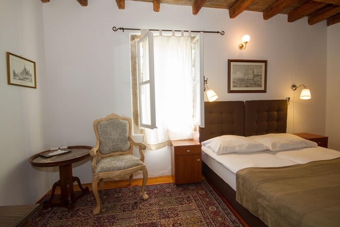 Imagen de la habitación del Hotel Casa Garzotto Integrated. Foto 10