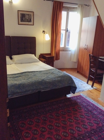 Imagen de la habitación del Hotel Casa Garzotto Integrated. Foto 15