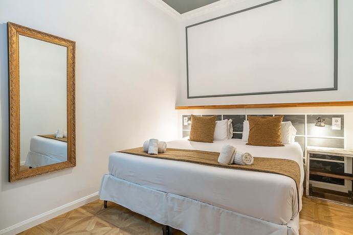 Imagen de la habitación del Hotel Casa Gracia Apartments. Foto 8