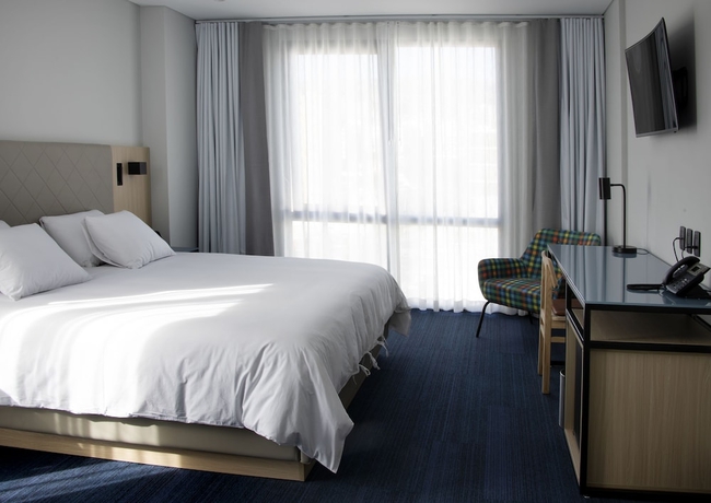 Imagen de la habitación del Hotel Casa Grande Express. Foto 11