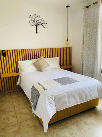 Imagen de la habitación del Hotel Casa Grangelo. Foto 10