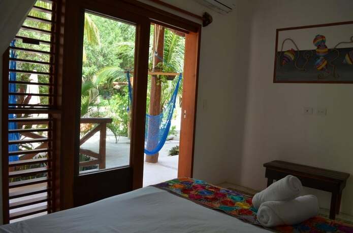 Imagen de la habitación del Hotel Casa Iguana Holbox. Foto 17