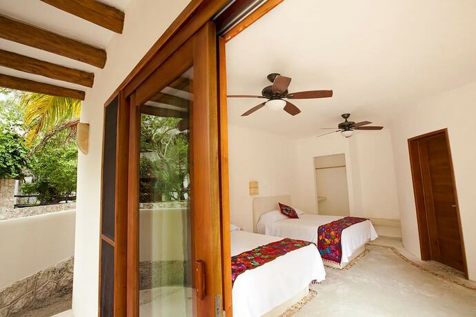 Imagen de la habitación del Hotel Casa Iguana Holbox. Foto 18